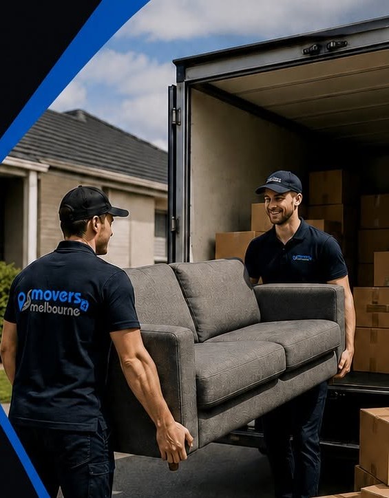 Two Movers4Melbourne removalists carrying a couch to the truck